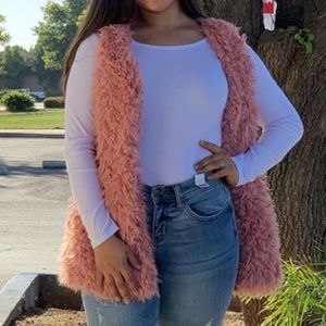 Pink furry vest